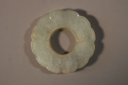 null CHINA, QING Dynasty (1644 - 1911)
A celadon and rust jade (nephrite) pebble...