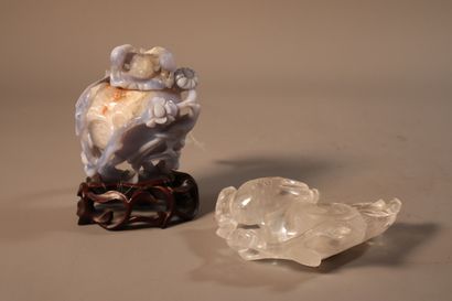 null CHINA, 19th century
A rock crystal brush washer in the shape of two digested...