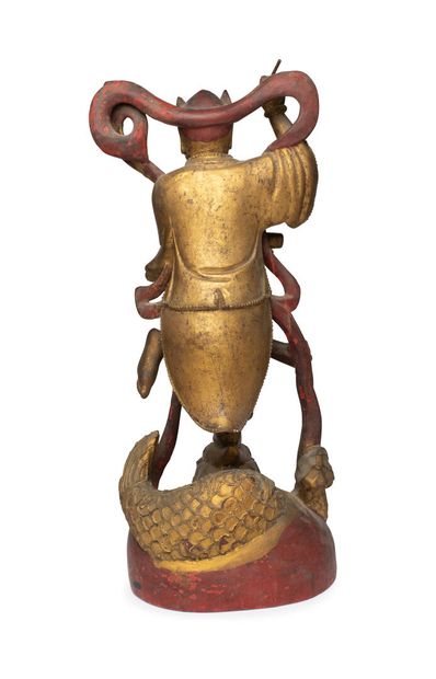 null CHINE, XIXe siècle	
Statuette de Kui Xing en bois laqué or 
debout sur une jambe...