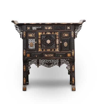 null VIETNAM, About 1900
Carved wood chest of drawers with bone and mother-of-pearl...