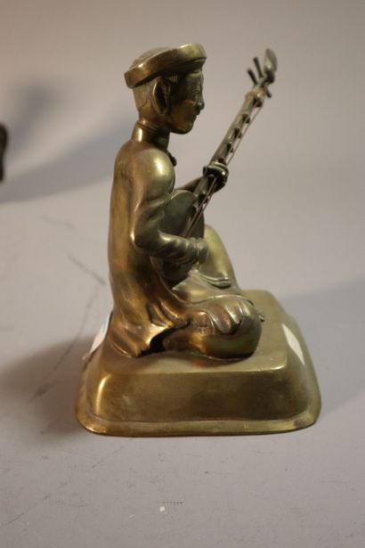null CHINE et THAILANDE, XXe siècle
Ensemble de sept statuettes en bronze dépatiné
représentant...
