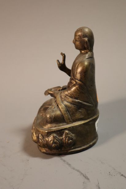 null CHINE et THAILANDE, XXe siècle
Ensemble de sept statuettes en bronze dépatiné
représentant...