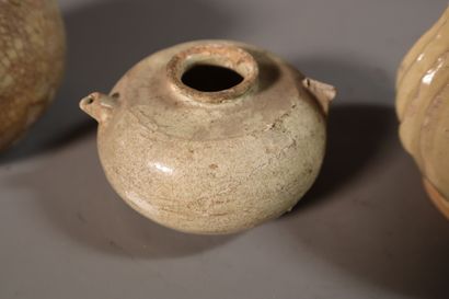 null VIETNAM, Tanhoa, 12th/13th century
Three beige glazed stoneware pots with cracks,...