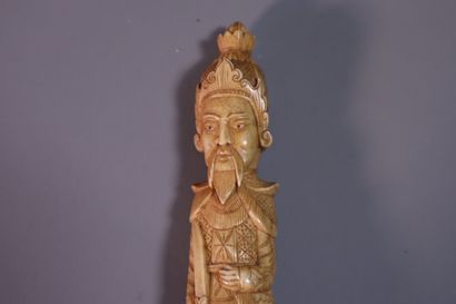 null VIETNAM, About 1900
Two statuettes in carved bone, a standing warrior and a...