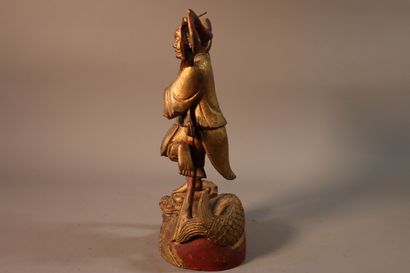 null CHINE, XIXe siècle	
Statuette de Kui Xing en bois laqué or 
debout sur une jambe...