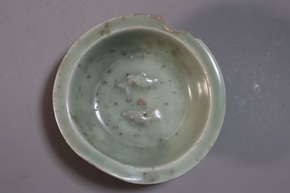 null CHINA, Longquan kilns, SONG Dynasty (960 - 1279)
Set in celadon glazed stoneware...