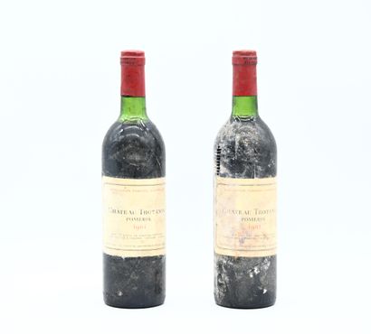 null 2 bouteilles CH. TROTANOY, Pomerol 1981 (es, elt, 1 J, 1 LB)