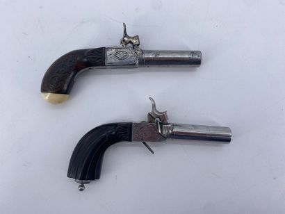 null Lot of two Pistols punch and with the Scotch one of which with engraved lock....