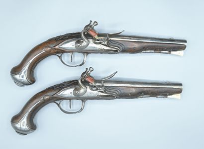 Pair of flintlock pistols. Long barrels and...