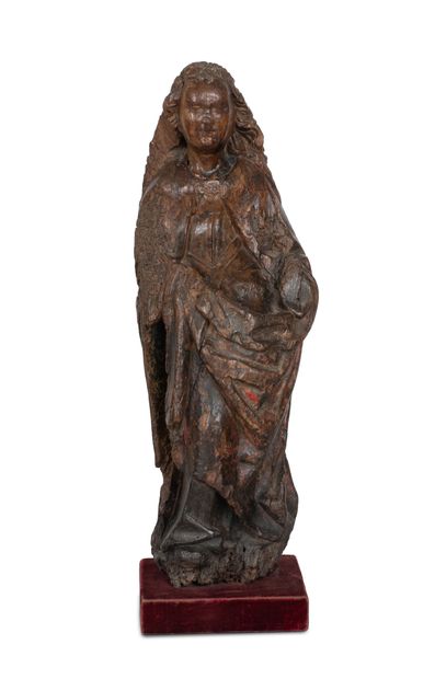 null PAYS-BAS MÉRIDIONAUX, VERS 1500
Sainte Femme ou Vierge en noyer sculpté en ronde-bosse...