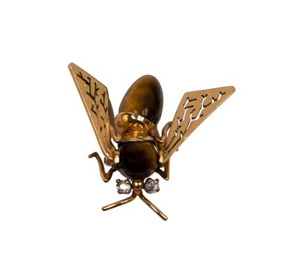 null TRAVAIL FRANÇAIS
Broche clip abeille en or 750°/00,
corps en oeil-de-tigre et...