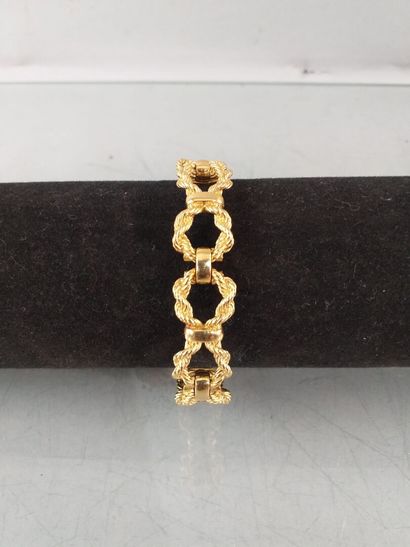 null Bracelet articulé à grosse maille
noeud tressé en or jaune 750°/00 avec attache...