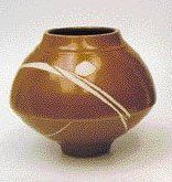 Robert DEBLANDER Vase pansu en porcelaine à épaulement marqué au niveau de la panse,...