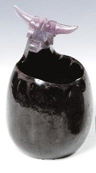 MATHIS Sylvain, né en 1967 "IDOLE ENFANTINE" Sculpture en pâte de cristal noire simulant...