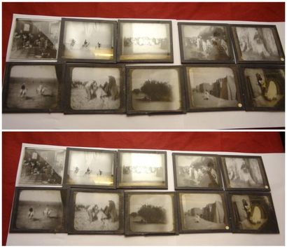 null Dix petites plaques photographiques en verre représentant neuf scènes animées...
