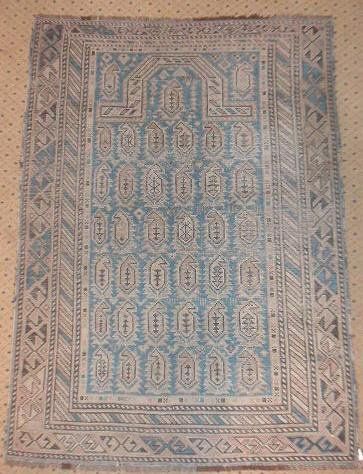 null Tapis Chirvan, XIXe siècle, fond bleu, décor d'une semis de palmes sous une...