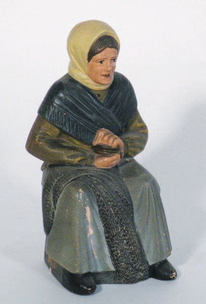 null Terre cuite peinte : Femme assise, tirelire perdue. Hauteur : 22 cm.