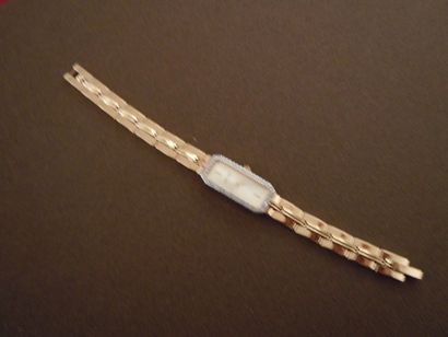 null MONTRE bracelet de femme Louis Pion en métal doré, cadran rectangulaire serti...