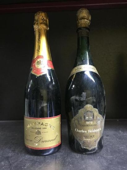 null 2 bouteilles de Champagne: 1 Charles Heidseick. 1 Veuve Durand