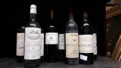 null 9 bts de vin: 1 Bt Mouton Cadet 1970 + 1 bt Chateau La barbe blanche, Saint...