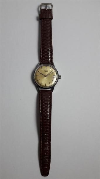 null LONGINES. Montre bracelet mécanique. bracelet cuir. Diam: 34 cm