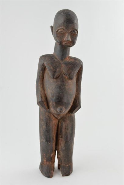 null STATUE féminine. Bois lourd patine brun rouge clair
Burkina-Faso, Lobi
Haut...