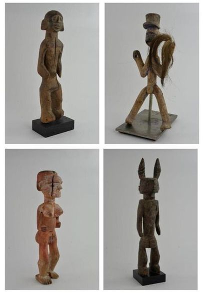 null 213 à 216 - QUATRE STATUETTES africaines en bois dont l'une peinte et l'autre...