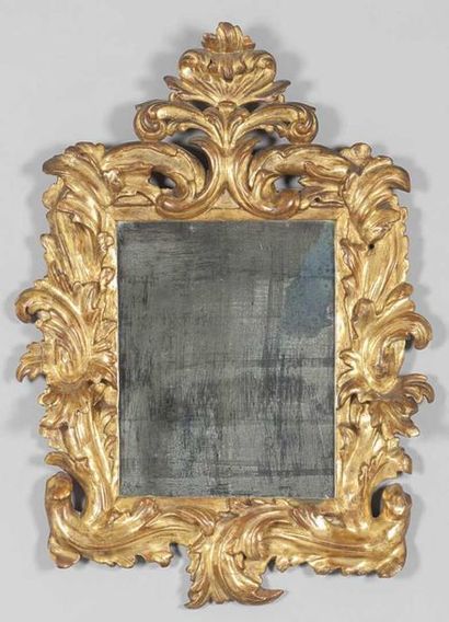 Gènes, XIXe siècle Miroir en bois sculpté Miroir en bois sculpté de volutes et rinceaux,...