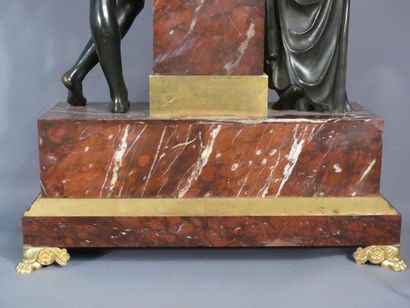 Pendule d'après Claude GALLE d'après Claude GALLE. Pendule en marbre rouge et bronze...