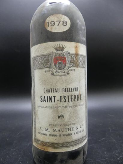 null 1 bouteille de CHATEAU BELLEVUE Saint-Estéphe 1978. Taches sur l'étiquette....