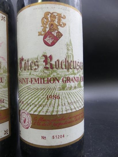 null 2 bouteilles de COTES ROCHEUSES Saint émilion grand cru l'un de 1986 et l'autre...