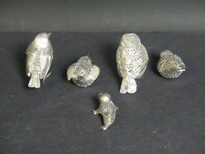 null CHRISTOFLE. Ensemble d'animaux en métal argenté composé de 6 oiseaux et 12 phoque....