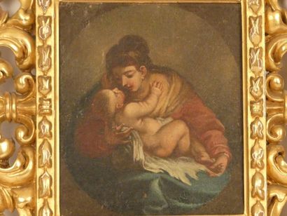 VIERGE A L'ENFANT Ecole du XVIIème siècle. Vierge à l'enfant, huile sur toile. Cadre...