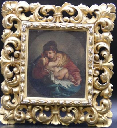 VIERGE A L'ENFANT Ecole du XVIIème siècle. Vierge à l'enfant, huile sur toile. Cadre...