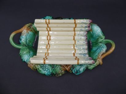 Plat à asperges. Plat à asperges en barbotine polychrome. Dimensions : 10 x 37 x...