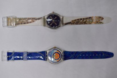 MONTRES Réunion de deux montres. Une swatch à décor astrologique, quartz, étanche...