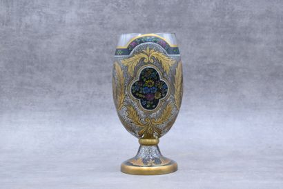 null Dans le goût de Théodore Legras. Vase en verre émaillé à décor stylisé de feuillages....