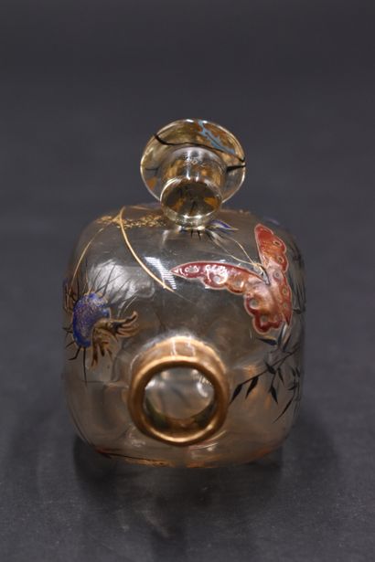 null Emile GALLE (1864-1904). Bottle with spherical body of square section on pedestal...