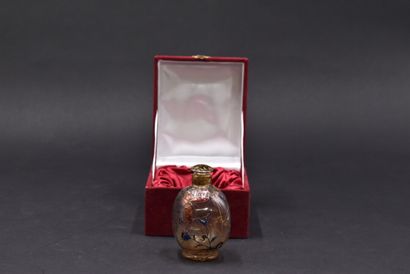 null Emile GALLE (1864-1904). Bottle with spherical body of square section on pedestal...