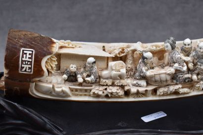 CHINE CHINA. Carved ivory tusk with characters, c. 1920, carved wooden base. Length...