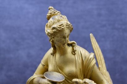 Pendule en bronze Epoque Empire Pendule en bronze ciselé doré divinité à l'Aigle....