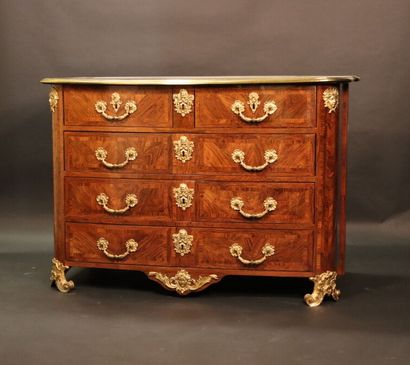 null Rosewood veneer chest of drawers. It opens with five drawers on four rows, separated...