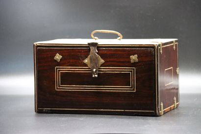 null Indo-Portuguese travelling cabinet in rosewood veneer and ivory marquetry. Brass...