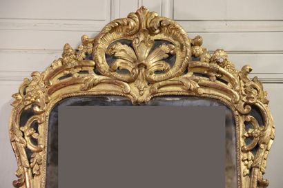 null Work of the 18th century from the South of France. Mirror with a rich carved...