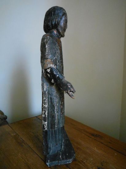 null Carved and polychromed wood ecclesiastic, hollowed back. End of the 17th century....