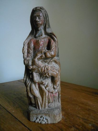 null Virgin of Pity in carved and polychromed wood, monoxyle base. 16th century....