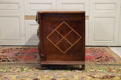null Moulded and inlaid wood chest of drawers with geometrical decorations, walnut...
