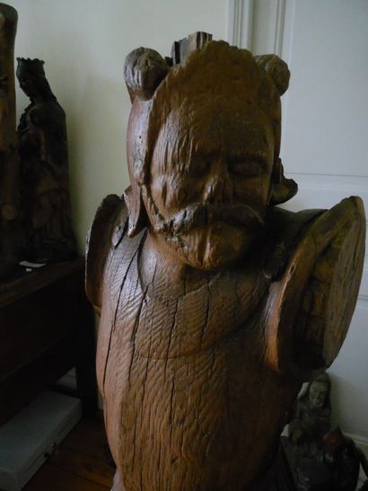 null Oak soldier carved in the round with remains of polychromy. Standing with his...