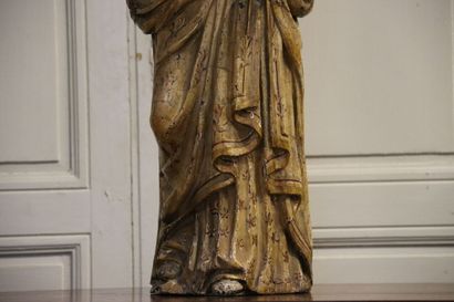 null School of the 16th century. Holy woman. Dress and polychrome drapery with flowers....