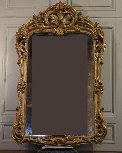 null Work of the 18th century from the South of France. Mirror with a rich carved...